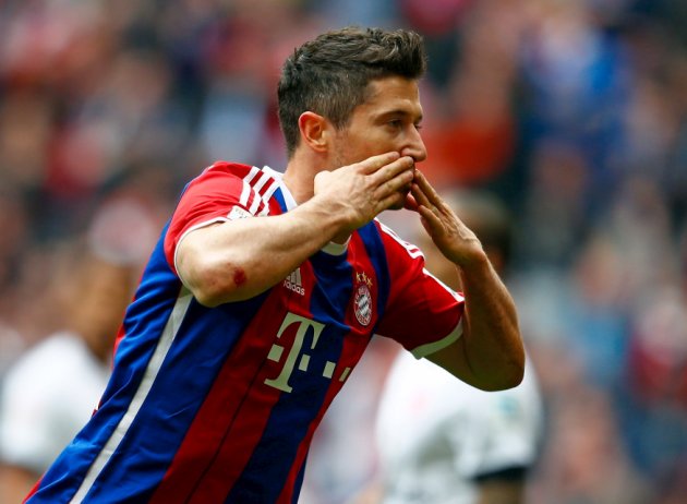 Bayern Munich's Lewandowski celebrates after scoring against Eintracht Frankfurt during their German Bundesliga first division soccer match in Munich